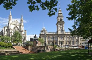 the-octagon-center-of-dunedin-new-zealand-with-st-pauls-cathedral-to-the-left-and-municipal-chambers-more-to-the-right